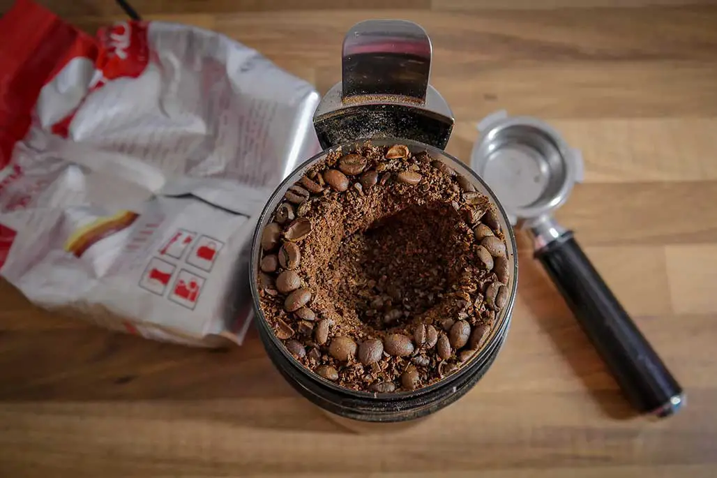 can you put ground coffee in a burr grinder